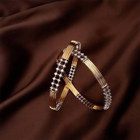 Gold bangles with diamond accents